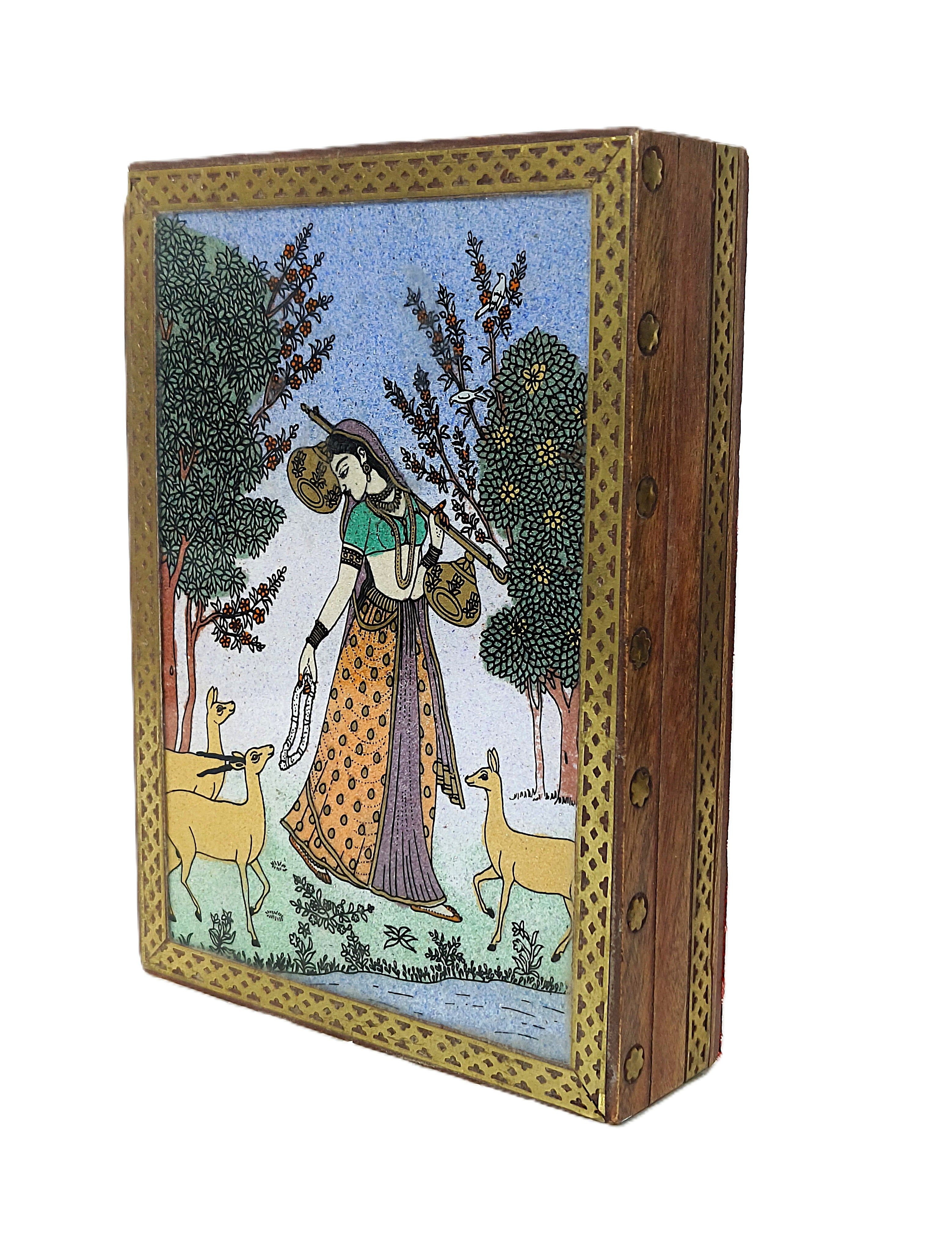 Magnificent wooden storage box with a velvet lining, adorned with crushed Indian gemstones